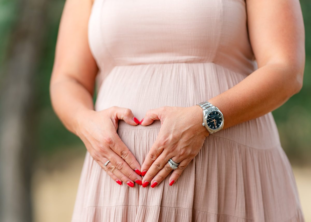 Maternity portrait in soft natural light, photographed by Seth Rusackas.