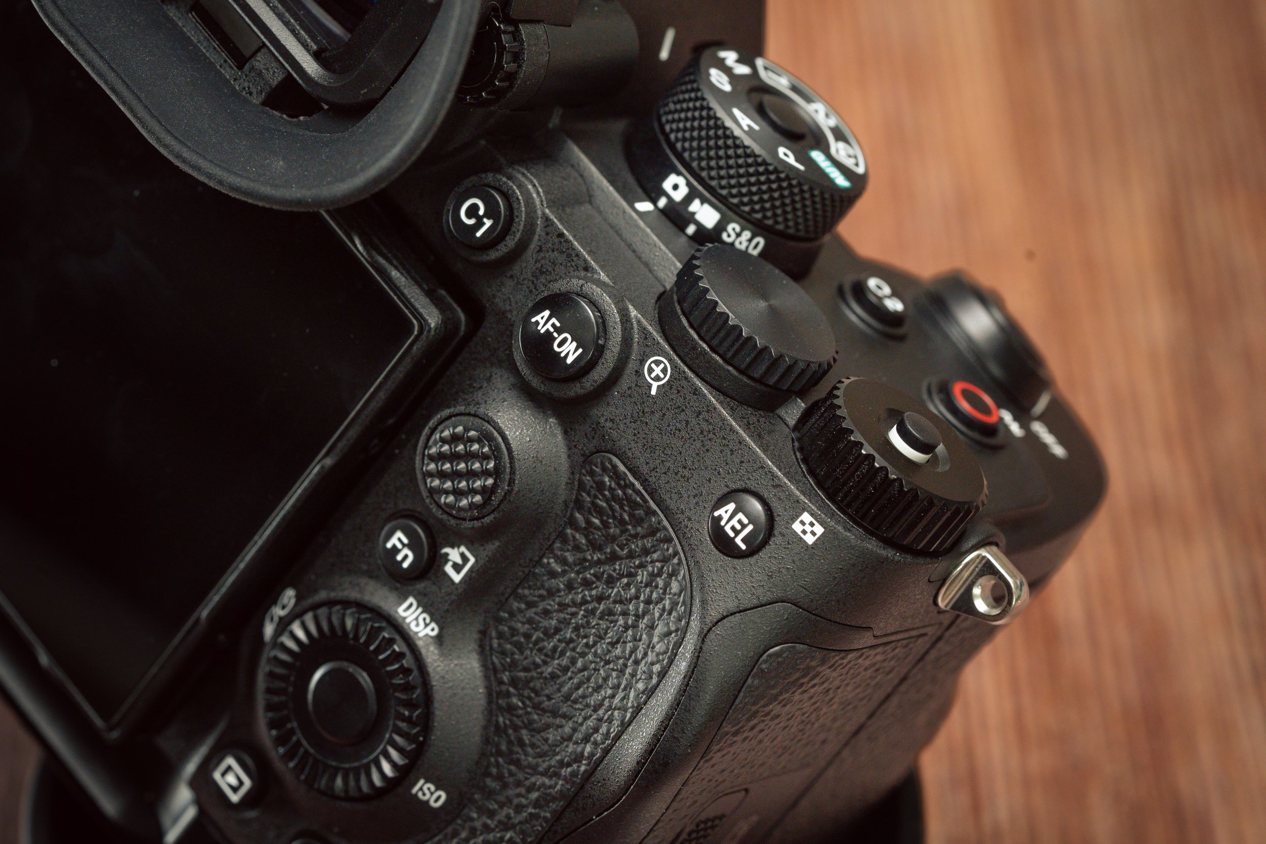 The control layout of the A7RV, showing the new third dial that replaced the older exposure-compensation dial. It can be programmed for almost anything — ISO, white balance, exposure compensation, whatever.